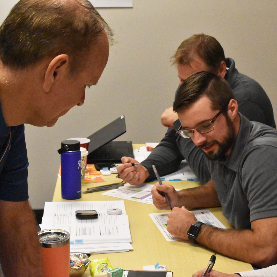 Jim and student discussing RULA handout