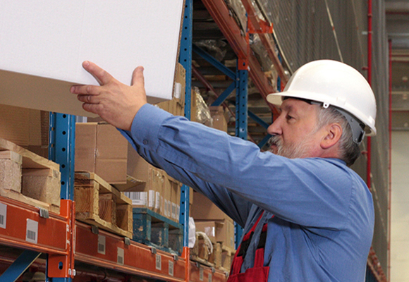 Employee lifting white box