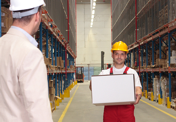 Man holding white cardboard box