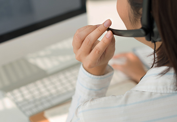 Woman talking into headset