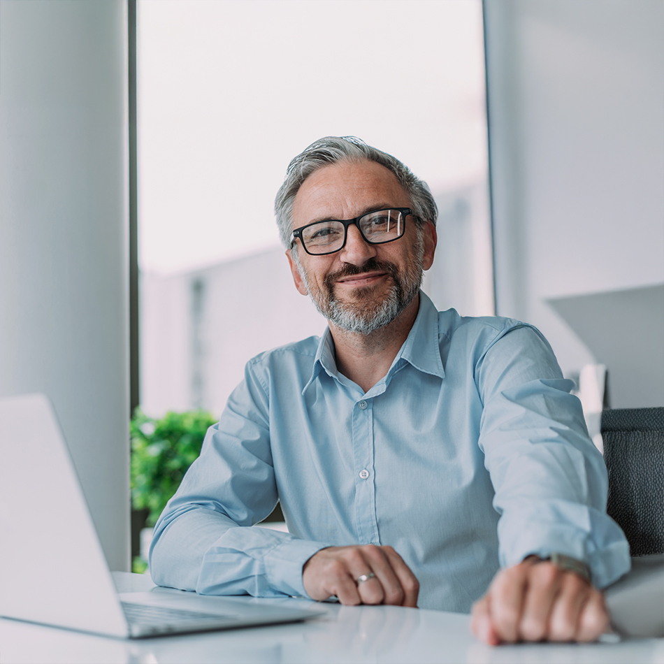 Therapy owner sitting at desk